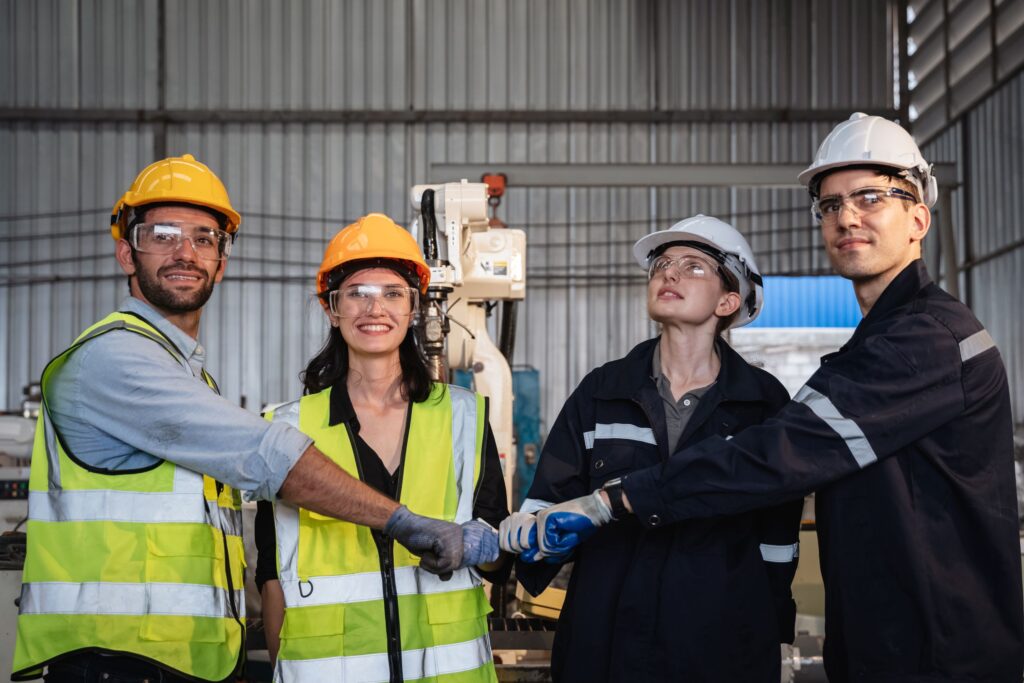 team-engineers-and-foreman-stack-hand-and-shake-ha-2025-03-16-03-22-10-utc
